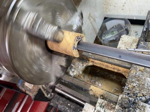 Coring teak burl for forearm.